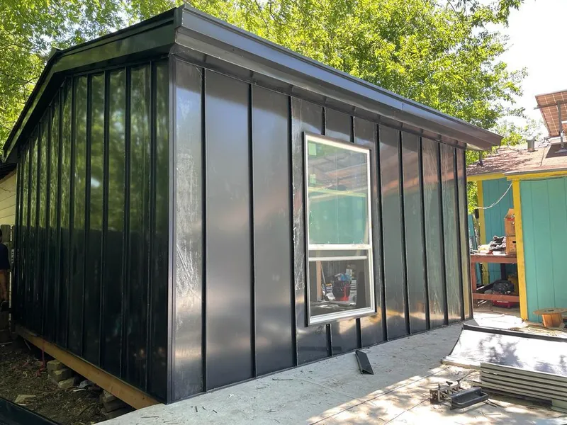 Black standing seam metal wall panels for Roof Inspection in Oak Hills