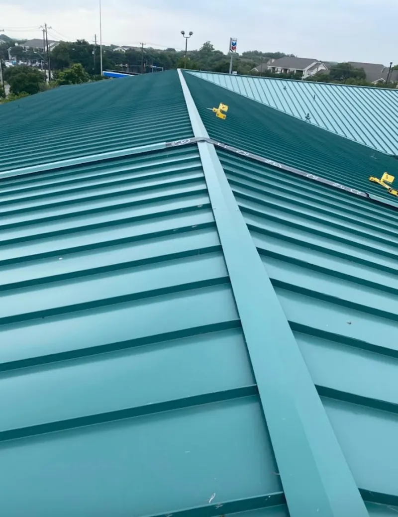 Green commercial metal roof ridge and valley for Metal Roof Repair in Oak Hills
